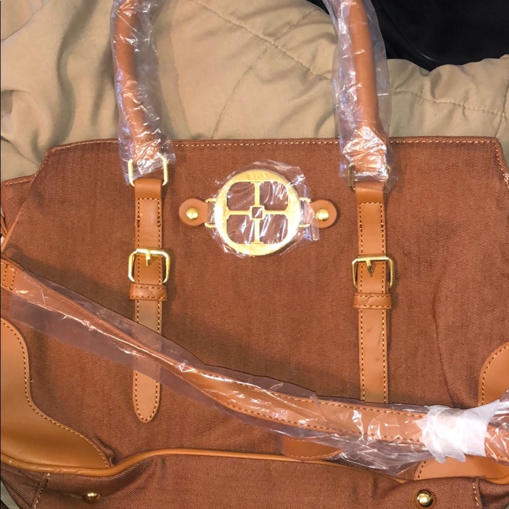 Never Used Iman Purse :)